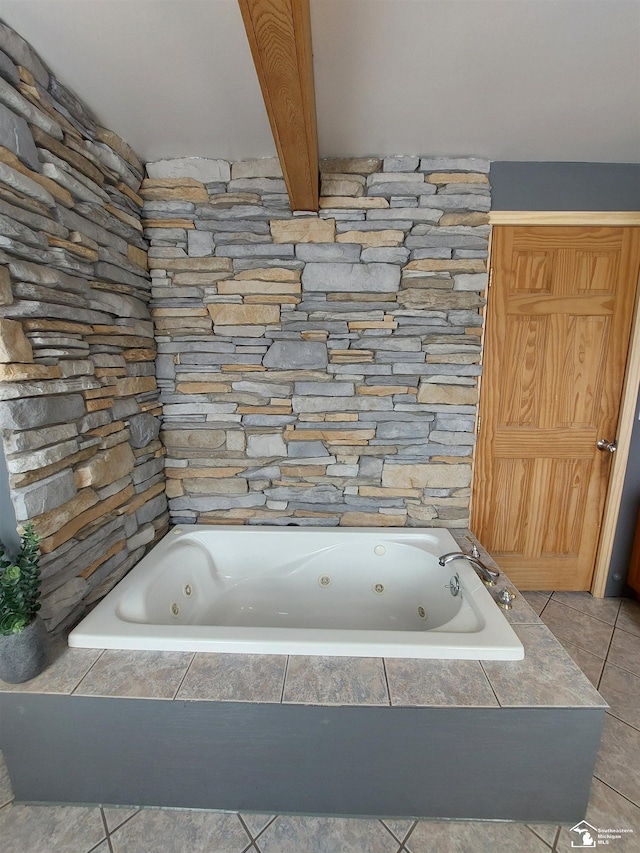 3023 W Stein Rd, La Salle, MI 48145 - bathroom featuring a tub with jets, tile patterned floors, and beamed ceiling
