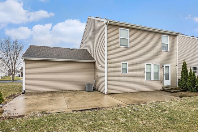 back of house featuring cooling unit and a patio
