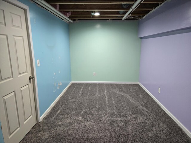 finished below grade area with carpet flooring and baseboards