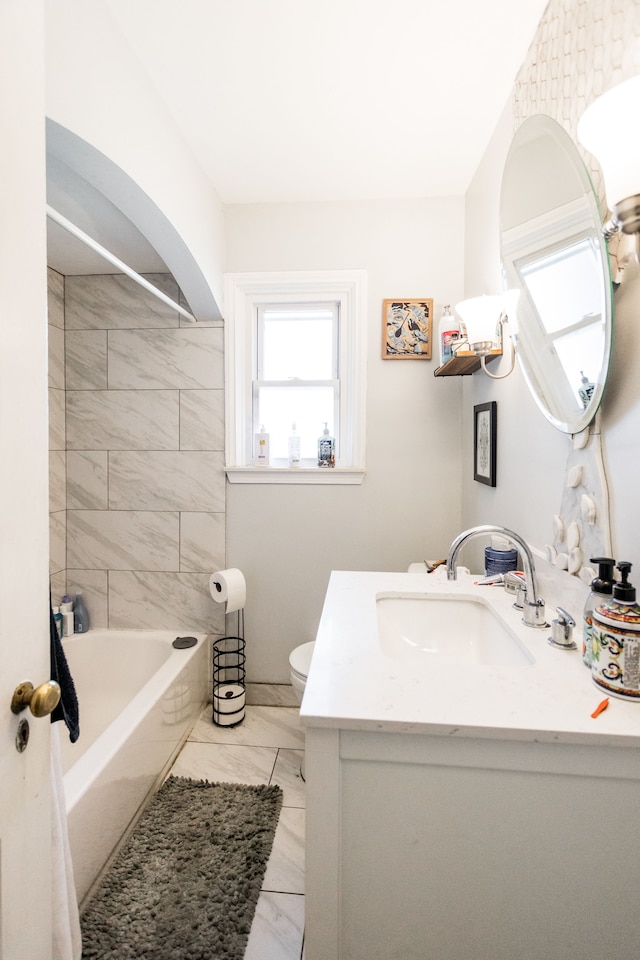 4494 Bishop St, Detroit, MI 48224 - bathroom featuring marble finish floor, vanity, shower / bath combination, and toilet