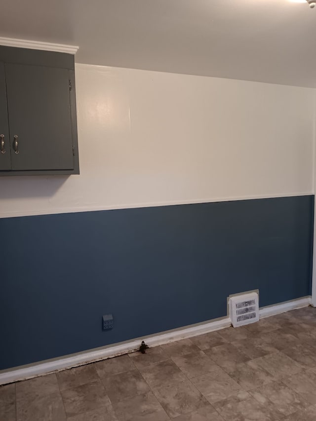 19726 Moross Rd, Detroit, MI 48224 - unfurnished room with baseboards and visible vents