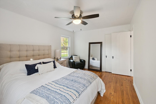 21124 Thorofare Rd, Grosse Ile, MI 48138 - bedroom featuring a ceiling fan and wood finished floors