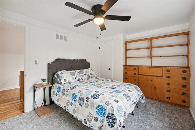 21124 Thorofare Rd, Grosse Ile, MI 48138 - carpeted bedroom featuring baseboards, visible vents, and ceiling fan