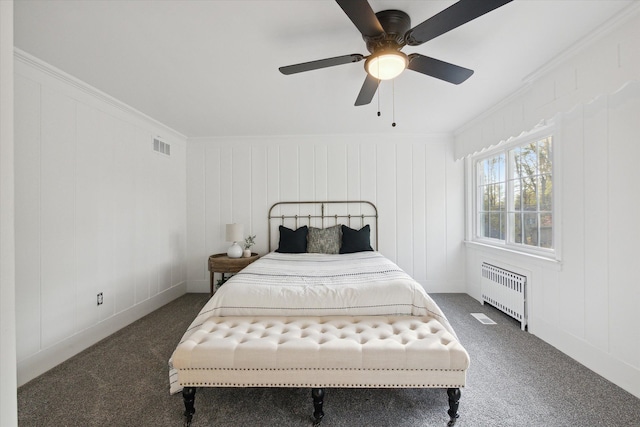 21124 Thorofare Rd, Grosse Ile, MI 48138 - bedroom with a decorative wall, radiator heating unit, visible vents, and carpet