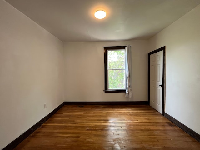 2563 Canton St, Detroit, MI 48207 - empty room with baseboards and hardwood / wood-style floors