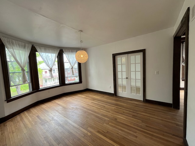 2563 Canton St, Detroit, MI 48207 - empty room featuring baseboards and hardwood / wood-style floors