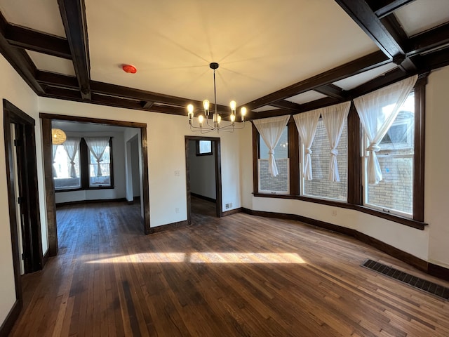 2563 Canton St, Detroit, MI 48207 - unfurnished dining area with dark wood-style floors, beam ceiling, baseboards, and a chandelier