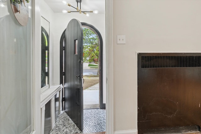 5784 Whittier St, Detroit, MI 48224 - entrance foyer featuring baseboards and an inviting chandelier