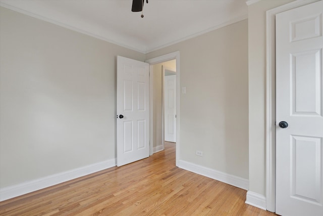 5784 Whittier St, Detroit, MI 48224 - unfurnished bedroom with ornamental molding, ceiling fan, baseboards, and light wood-type flooring