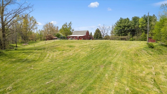 3440 Crandall Rd, Howell, MI 48855 - view of green lawn with a barn and an outdoor structure
