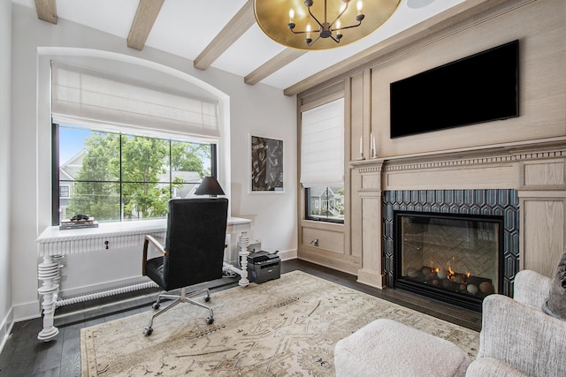 557 Greenwood Ave SE, East Grand Rapids, MI 49506 - home office with baseboards, wood finished floors, beam ceiling, a glass covered fireplace, and an inviting chandelier