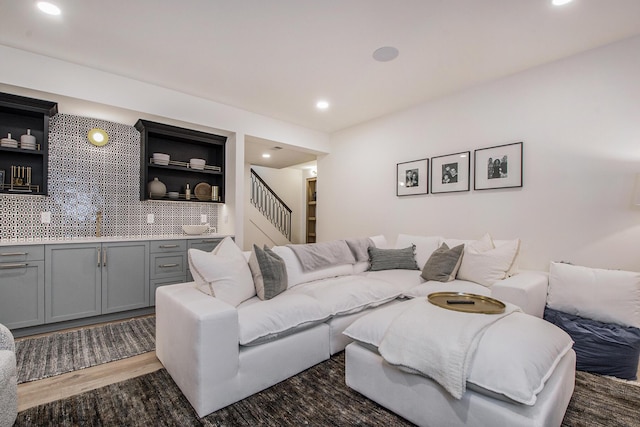 557 Greenwood Ave SE, East Grand Rapids, MI 49506 - living room with recessed lighting, wood finished floors, and stairway