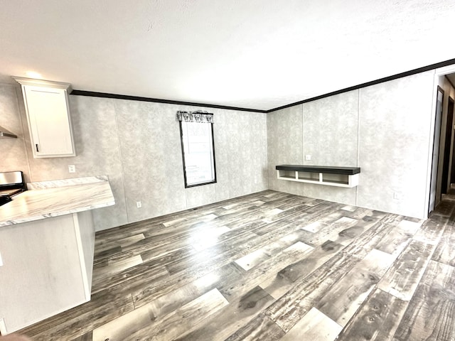 3502 Beech Ln, Twin Lake, MI 49457 - unfurnished living room with crown molding and wood finished floors