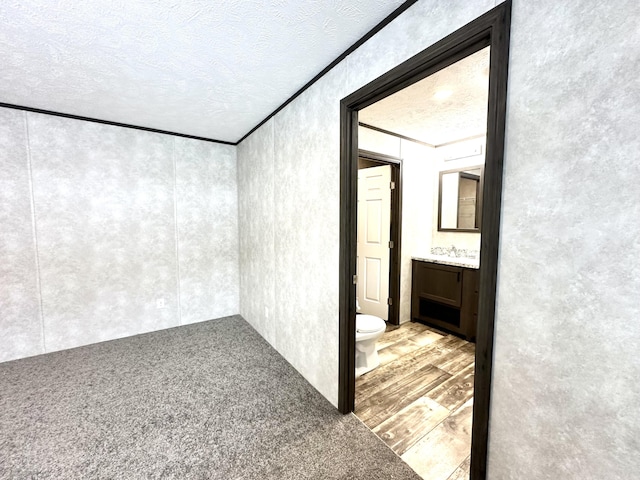 3502 Beech Ln, Twin Lake, MI 49457 - unfurnished room with a textured ceiling and ornamental molding
