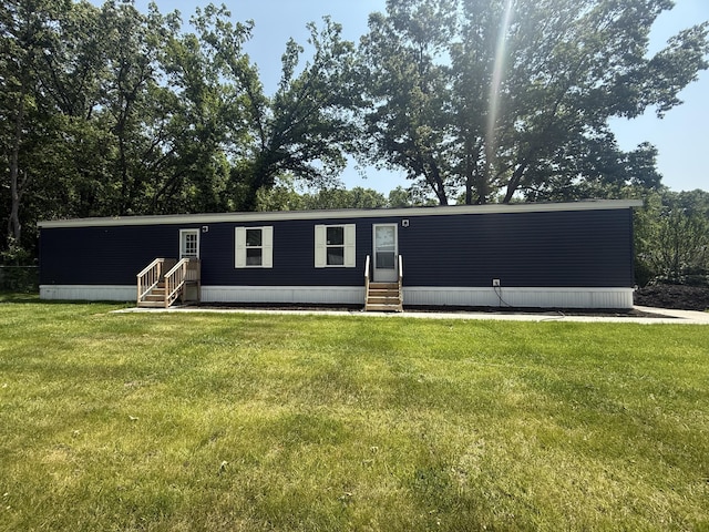 3502 Beech Ln, Twin Lake, MI 49457 - manufactured / mobile home with entry steps and a front yard