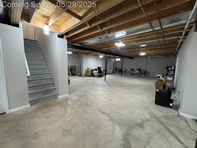 56098 Walker Ct, Macomb, MI 48042 - unfinished basement featuring stairs and baseboards