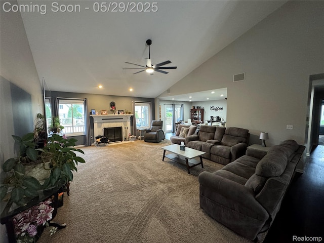 56098 Walker Ct, Macomb, MI 48042 - living room with ceiling fan, carpet floors, a fireplace, high vaulted ceiling, and recessed lighting