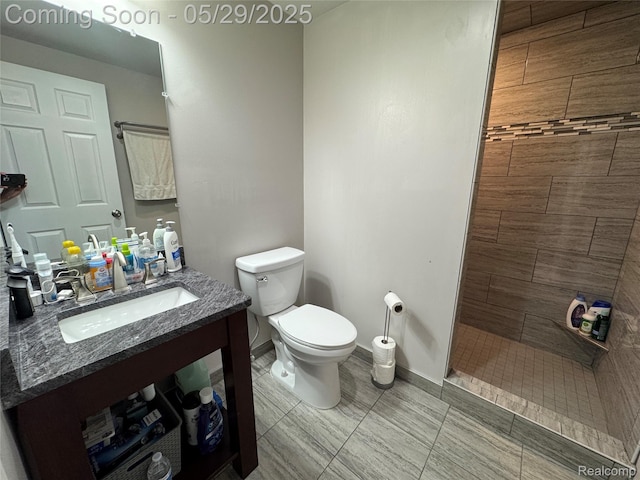 56098 Walker Ct, Macomb, MI 48042 - full bathroom with a stall shower, vanity, toilet, and baseboards
