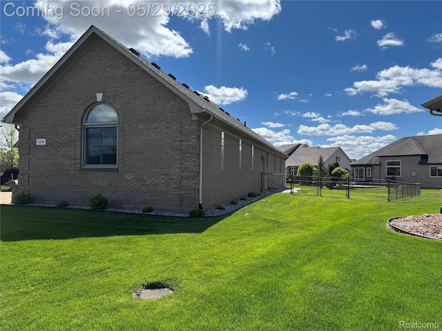 56098 Walker Ct, Macomb, MI 48042 - view of property exterior with brick siding
