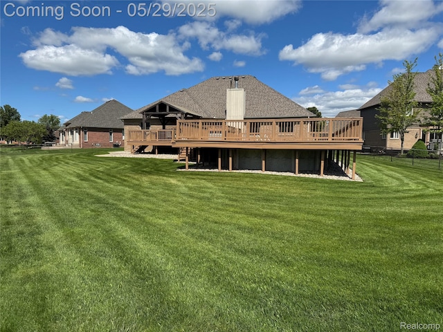 56098 Walker Ct, Macomb, MI 48042 - rear view of house featuring a deck and a shingled roof