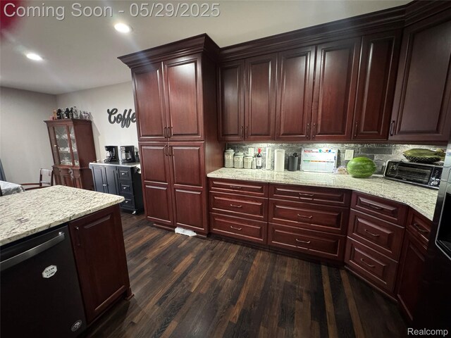56098 Walker Ct, Macomb, MI 48042 - kitchen with dark wood finished floors, decorative backsplash, reddish brown cabinets, light stone countertops, and recessed lighting