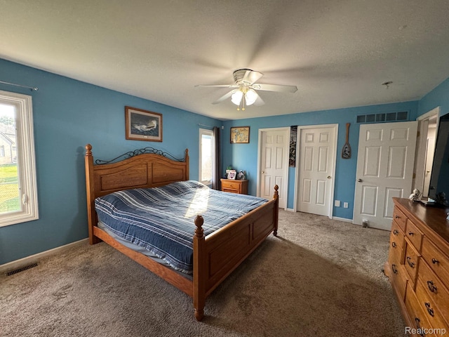 56098 Walker Ct, Macomb, MI 48042 - carpeted bedroom with a ceiling fan and a closet