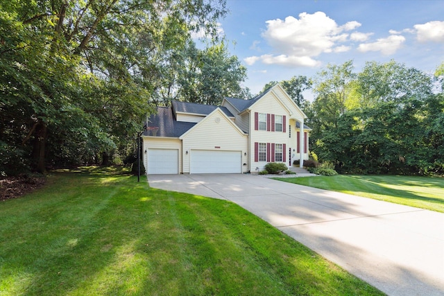 traditional home featuring a front lawn, a shingled roof, an attached garage, and concrete driveway