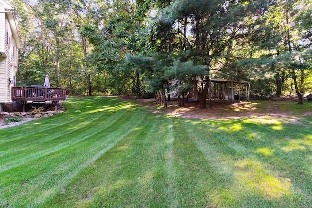 view of yard featuring a deck