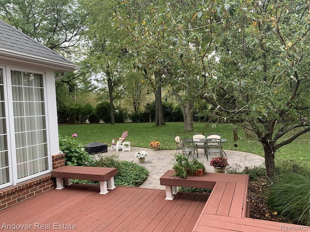 2004 Timberview Dr, Okemos, MI 48864 - wooden terrace with a patio area, a lawn, outdoor dining area, and view of scattered trees