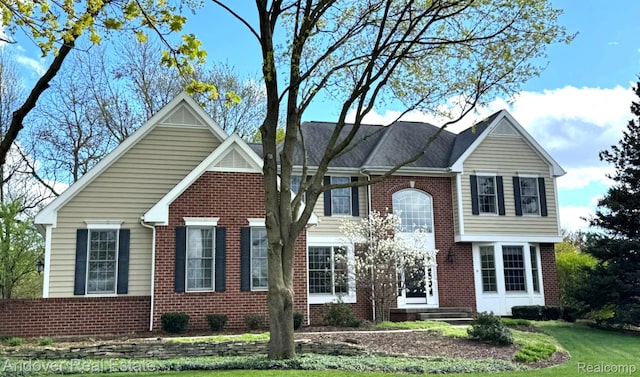 2004 Timberview Dr, Okemos, MI 48864 - view of front of property featuring brick siding and a front lawn