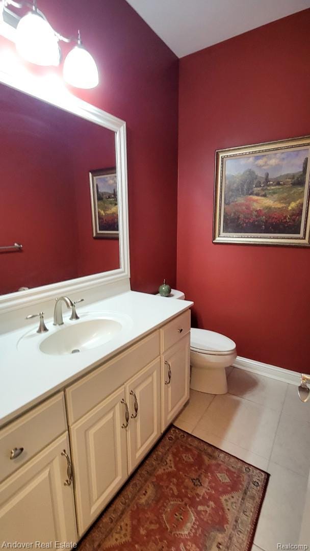 2004 Timberview Dr, Okemos, MI 48864 - bathroom featuring vanity, toilet, and tile patterned floors