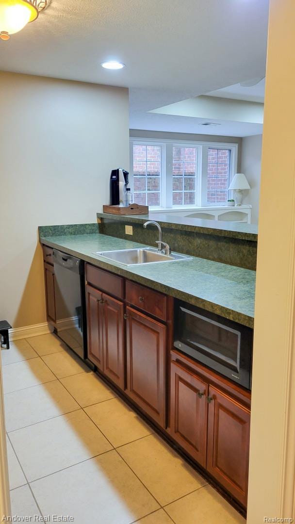 2004 Timberview Dr, Okemos, MI 48864 - kitchen with black dishwasher, a sink, light tile patterned floors, baseboards, and recessed lighting