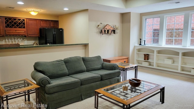 2004 Timberview Dr, Okemos, MI 48864 - living room with recessed lighting, carpet flooring, and bar area
