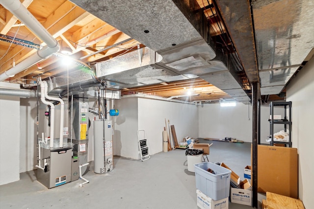 unfinished basement with water heater and heating unit