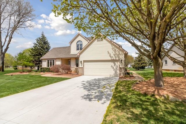 traditional home featuring brick siding, a front lawn, concrete driveway, an attached garage, and a shingled roof