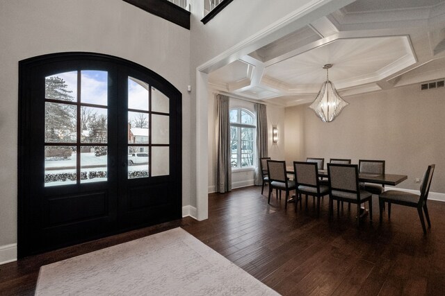 1044 Lakeside Dr, Birmingham, MI 48009 - foyer featuring dark wood-type flooring, visible vents, baseboards, and a notable chandelier