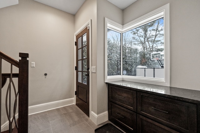 1044 Lakeside Dr, Birmingham, MI 48009 - doorway with baseboards and stairway