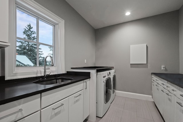 1044 Lakeside Dr, Birmingham, MI 48009 - laundry room featuring baseboards, a sink, independent washer and dryer, recessed lighting, and cabinet space