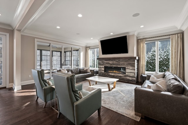 1044 Lakeside Dr, Birmingham, MI 48009 - living room with crown molding, a stone fireplace, and a wealth of natural light