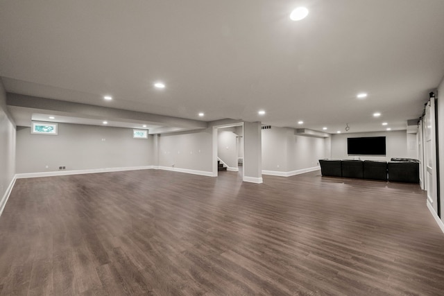 1044 Lakeside Dr, Birmingham, MI 48009 - unfurnished living room featuring dark wood-style flooring, baseboards, stairway, and recessed lighting