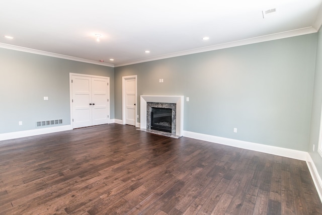 1044 Lakeside Dr, Birmingham, MI 48009 - unfurnished living room with dark wood-type flooring, ornamental molding, visible vents, recessed lighting, and baseboards
