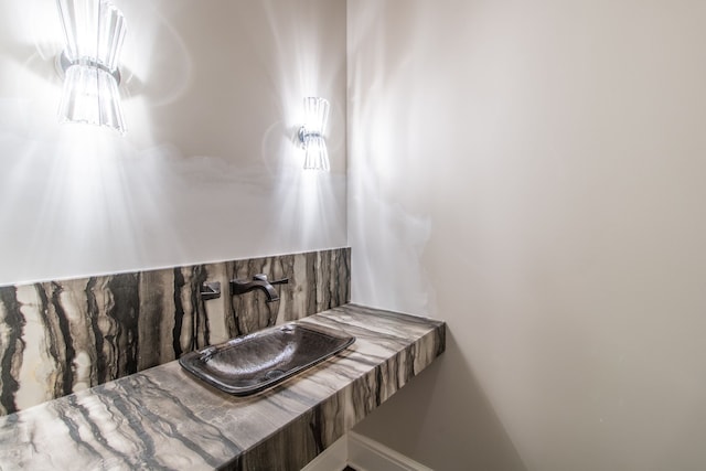 1044 Lakeside Dr, Birmingham, MI 48009 - bathroom with a sink and backsplash