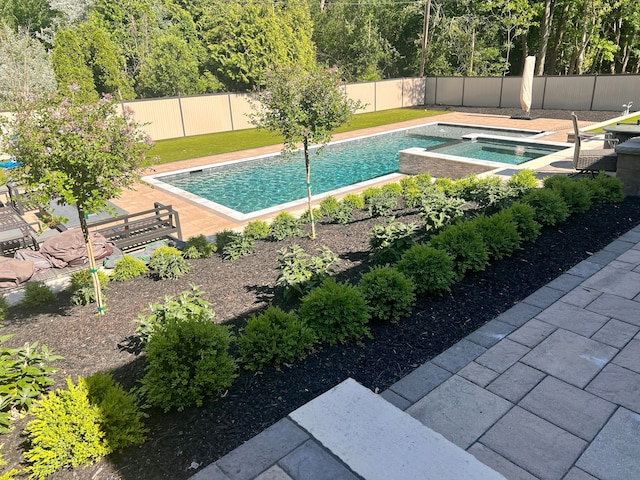 1044 Lakeside Dr, Birmingham, MI 48009 - view of pool with a patio, a fenced backyard, a fenced in pool, and an in ground hot tub