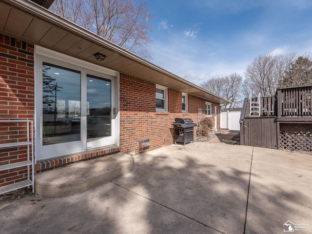 view of patio featuring a grill