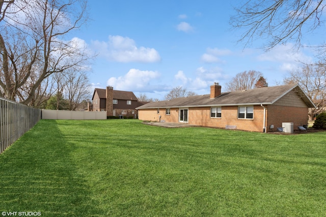 4129 Hailey Dr, Saint Joseph, MI 49085 - view of yard featuring a patio, a fenced backyard, and cooling unit