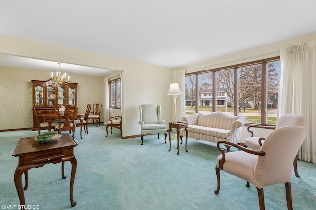 4129 Hailey Dr, Saint Joseph, MI 49085 - carpeted living area featuring an inviting chandelier, wallpapered walls, and baseboards