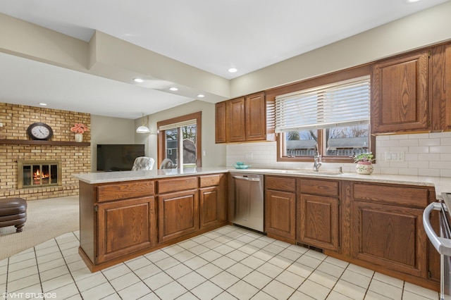 4129 Hailey Dr, Saint Joseph, MI 49085 - kitchen featuring open floor plan, light countertops, and stainless steel dishwasher