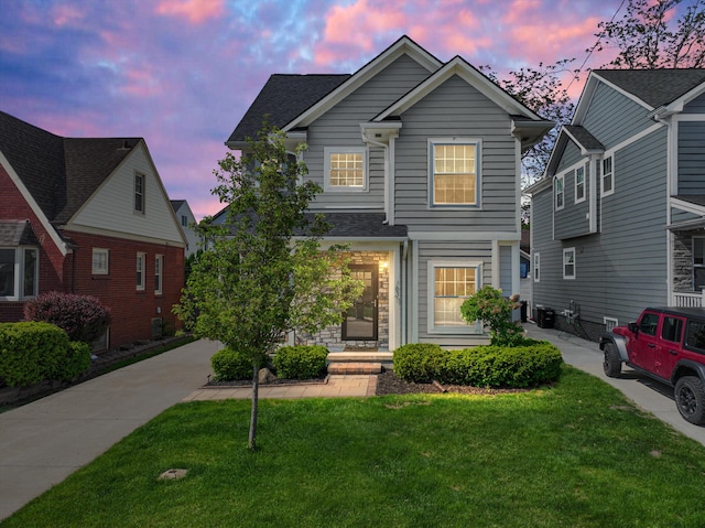 traditional home with a yard