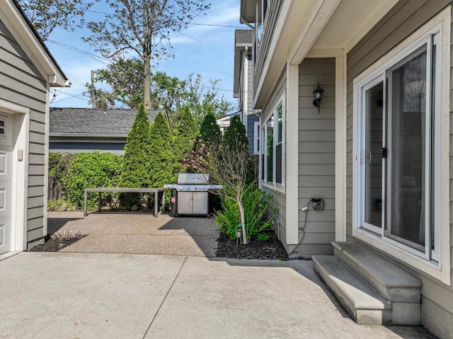 view of patio featuring grilling area and entry steps