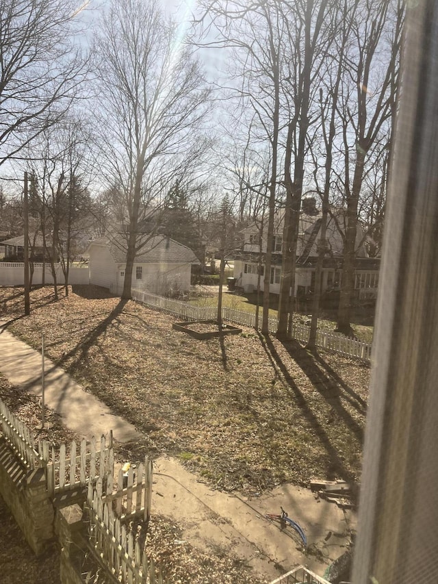 345 S Cochran Ave, Charlotte, MI 48813 - view of yard featuring fence